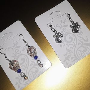 New Earrings set 2 pairs skulls and paw print earrings